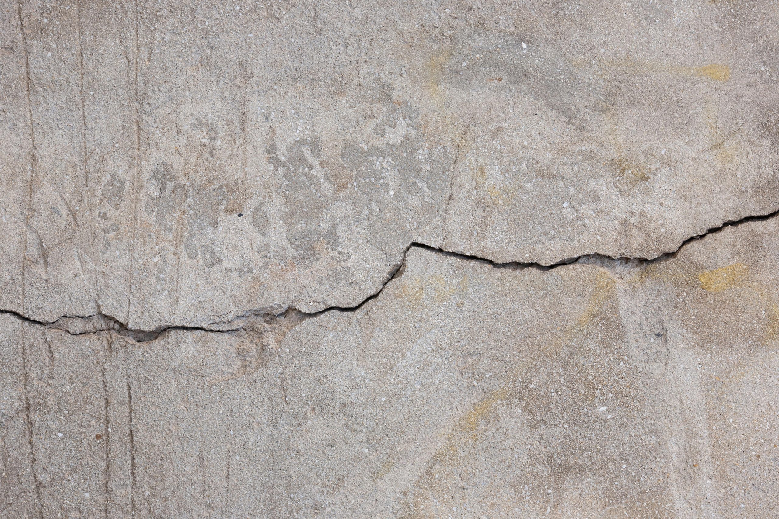 Neighbors contractor negligently damaged my building. My insurance says defects and construction are excluded from my policy.